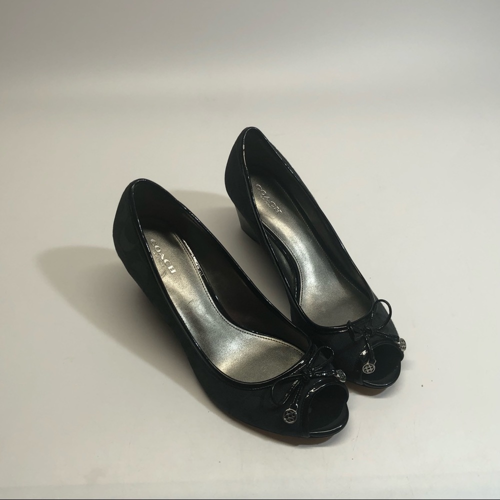 Coach black heel shoes , used
